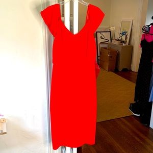 Bright coral red midi dress. Sleeves can be worn multiple ways